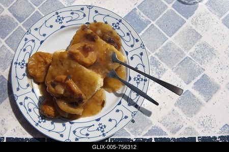 Mehlbuedel, a large flour dumpling, with dried fruit, a typical Friesian dish-stock-foto