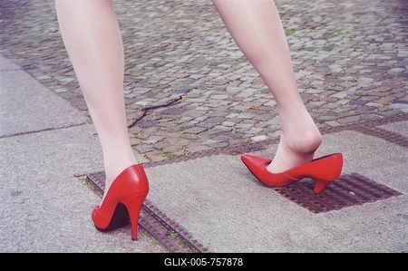 Misfortune, woman gets stuck in a hole with high heels, Berlin, Germany-stock-foto