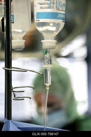 Bottle with infusion liquid for a patient during operation-stock-foto