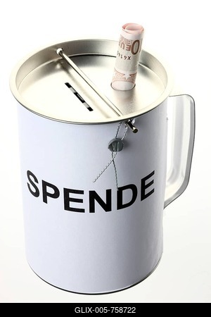 Donation box labeled Spende, German for donation, with slots for coins and bills, with a security seal to protect against unlawful opening-stock-foto