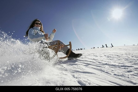 Girl is sledding, Hoherodskopf, Hesse, Germany-stock-foto
