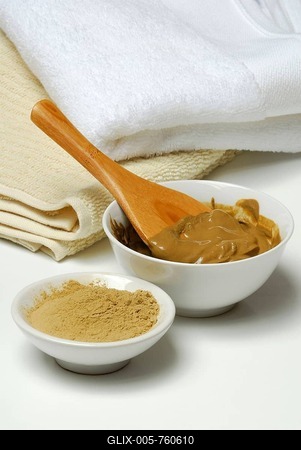 Healing earth, clay, red clay mixed with water, healing earth powder-stock-foto
