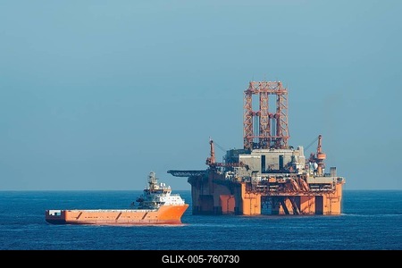 Supply vessel Normand Aurora next to West Phoenix oil rig, oil extraction, North Sea-stock-foto