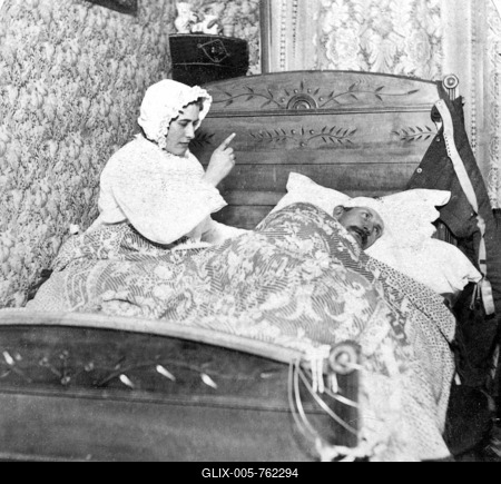 Historic photograph, woman scolding her husband in bed, around 1900-stock-foto