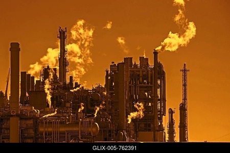 Industrial estate at sunset with orange sky showing BASF chemical production site in the port of Antwerp, Belgium-stock-foto