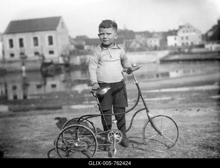 Historic photograph, child with a tricycle, around 1920-stock-foto