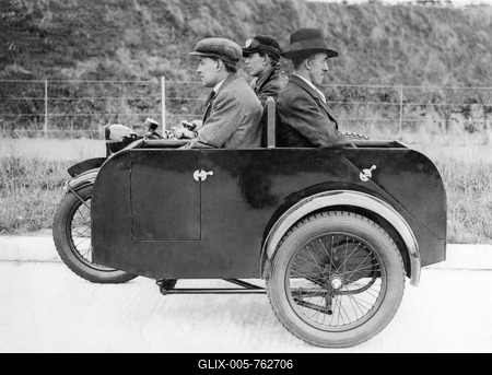 Historic photograph, three men on a motorcycle with a sidecar-stock-foto