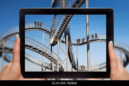 Hands holding tablet pc, with photo of Tiger and Turtle, Duisburg, Ruhr area, North Rhine-Westphalia, Germany-stock-foto