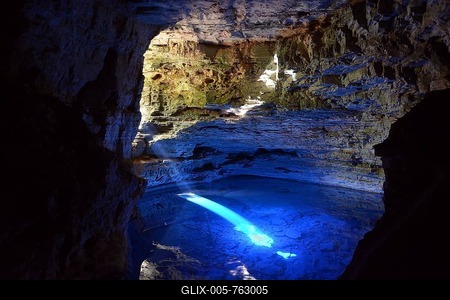 The colorful cave Poco Encantado with rays of light, Chapada Diamantina Mountains, Bahia, Brazil-stock-foto