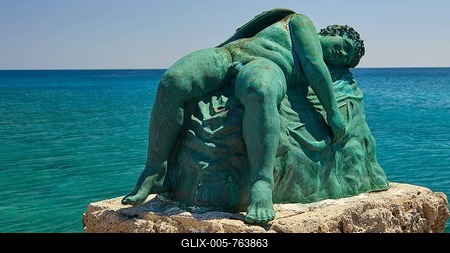 Bronze sculpture, sleeping Eros, close-up of an artistic statue on a rock by the blue water, harbour area, Rhodes Town, Rhodes, Dodecanese, Greek Islands, Greece-stock-foto