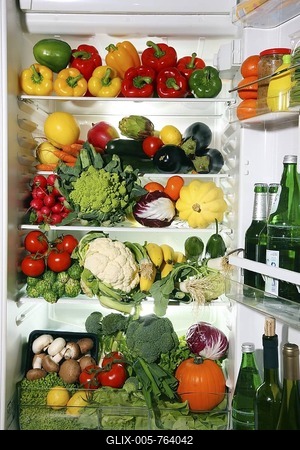 Fridge filled with different kinds of vegetables and fruit-stock-foto