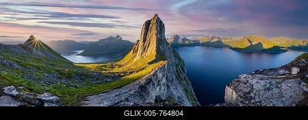 Sun rising over Bergen, morning atmosphere, steep mountain Segla, fjord Mefjorden with Bergen, island Senja, Troms, Norway-stock-foto