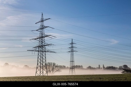 Electrical towers and power lines in the morning fog, Bochum-Werne, Bochum, North Rhine-Westphalia, Germany-stock-foto