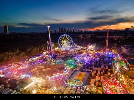 The lights of the Dippemess in Frankfurt am Main glow after sunset. Aerial view, ice rink, Frankfurt am Main, Hesse, Germany-stock-foto