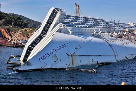 Bow with lettering name Costa Concordia of capsized cruise ship, in the background Giglio Island, Giglio Porto, Giglio Island, Tuscany, Italy-stock-foto