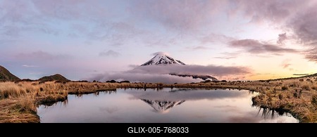 Water reflection in Pouakai Tarn Mountain Lake at sunset, Stratovolcano Mount Taranaki or Mount Egmont, Egmont National Park, Taranaki, New Zealand-stock-foto