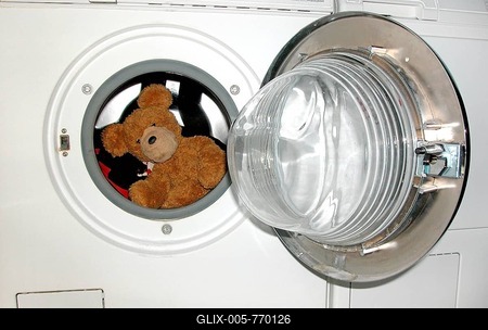 Soft toy, teddy bear in the washing machine, Berlin, Germany-stock-foto