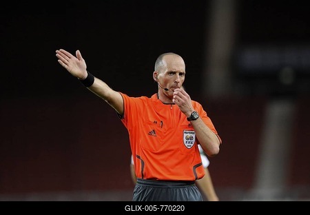 FIFA referee Michael Leslie DEAN, England, blowing whistle and gesticulating-stock-foto