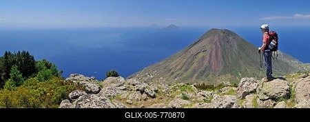 Hiker in front of a volcano on Salina, with the islands of Filicudi and Alicudi at the rear, Aeolian or Lipari Islands, Sicily, Southern Italy, Italy, Europe-stock-foto
