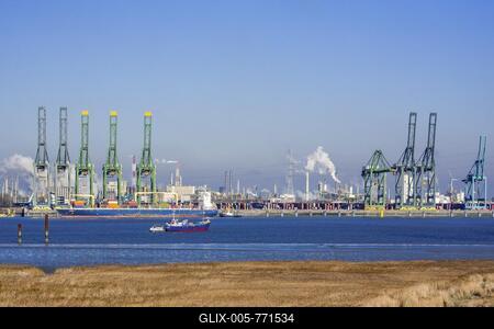 Harbor cranes and container ship docked in the Antwerp harbour, port, Flanders, Belgium-stock-foto