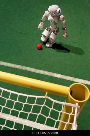NAO kicking a ball into a goal, a humanoid robot from Aldebaran Robotics, IdeenPark 2012, technology and education summit conference for young people, Essen, Ruhr area, North Rhine-Westphalia, Germany, Europe-stock-foto