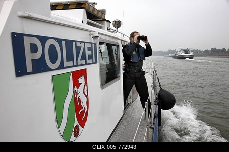Boat of the water police patrolling on the Rhine river at Duisburg, North Rhine-Westphalia, Germany, Europe-stock-foto
