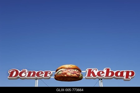Advertising for a doener kebab (donair) shop against a blue sky in Eckental, Middle Franconia, Bavaria, Germany, Europe-stock-foto