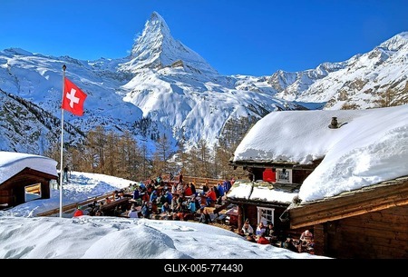 Mountain inn with sun terrace on the Riffelalp 2222m in front of Matterhorn 4478m, in winter, Zermatt, Mattertal, Valais, Switzerland-stock-foto