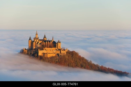 Burg Hohenzollern castle in morning light with autumn forest, morning mist, Schwaebische Alb, Swabian Alb, Baden-Wuerttemberg, Germany, Europe-stock-foto
