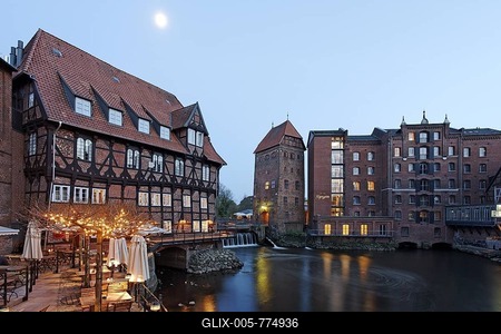 Restaurant terrace on the Ilmenau river, historic salt port with storage tower, Bergstroem four-star hotel, evening mood, old town, Lueneburg, Lower Saxony, Germany, Europe-stock-foto