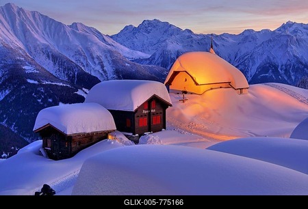 Chapel Maria in the snow with deep snow in the village centre, in the back Fletschhorn 3985m and cathedral 4545m at dusk, Bettmeralp, Aletsch area, Upper Valais, Valais, Switzerland-stock-foto