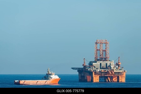 Supply vessel Normand Aurora next to West Phoenix oil rig, oil extraction, North Sea-stock-foto
