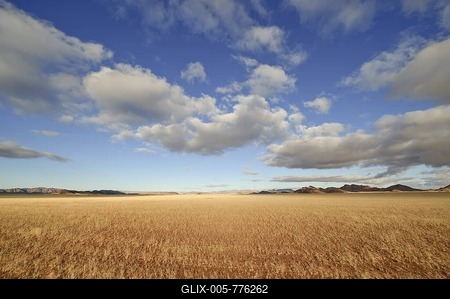 View from Sesriem Canyon over grass steppe into the Namib Desert, Republic of Namibia, Africa-stock-foto