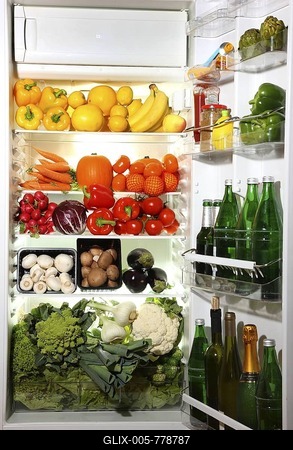 Fridge filled with different kinds of vegetables and fruit-stock-foto