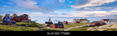 Typical architecture of Greenland Ilulissat with colored houses located near fjords and icebergs-stock-foto