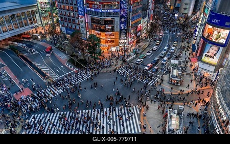Shibuya Crossing from above, crowds of people at intersection illuminated with street lights and colorful signs, illuminated advertising in the evening, railway station Shibuya, Shibuya, Udagawacho, Tokyo, Japan-stock-foto