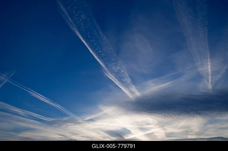 Small fluffy clouds, Cirrocumulus clouds, and medium-high stratus clouds, Altostratus, with contrails-stock-foto