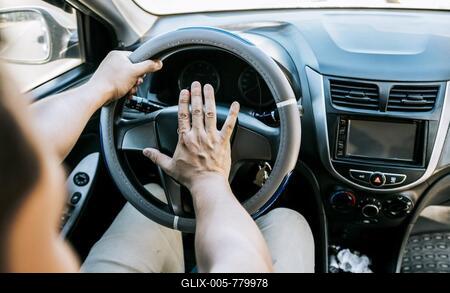 Close-up of driver honking car horn. Hand of angry driver honking car horn. Concept of impatient driver honking car horn, Driver man honking car horn-stock-foto