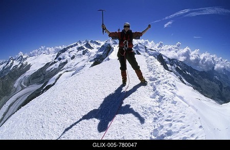 Woman on the summit of Breithorn Wallis Switzerland-stock-foto