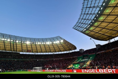 Football stadium illuminated with perimeter advertising, blue hour, DFB Cup Final 2018, Olympic Stadium Berlin, Germany-stock-foto