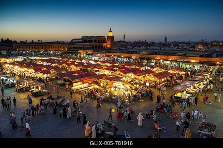 Many people on Djemaa el Fna square, UNESCO World Heritage Site, in the evening, Marrakech, Morocco-stock-foto