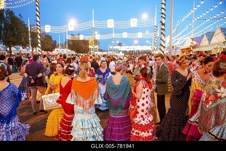 Spanish women with colorful flamenco dresses, evening mood, Feria de Abril, Sevilla, Andalusia, Spain-stock-foto
