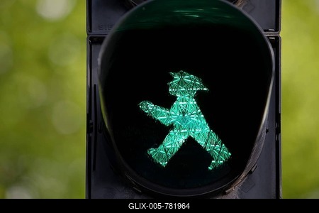 Pedestrian traffic light with green eastern traffic light man Galoppo by Karl Peglau, Berlin, Germany-stock-foto