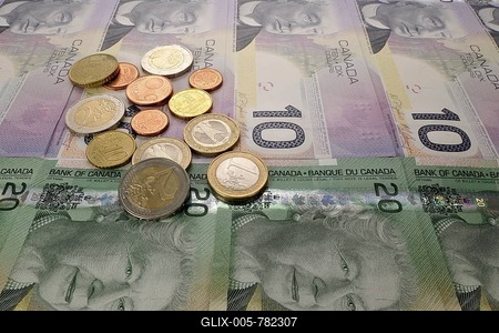 Various Canadian dollar banknotes with euro coins, symbolic image for exchange rate-stock-foto