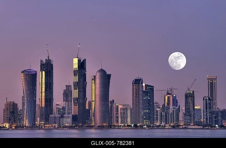 Skyline of Doha, Tornado Tower, Navigation Tower, Peace Towers, Al-Thani Tower, at dusk, Qatar, Persian Gulf, Middle East, Asia-stock-foto