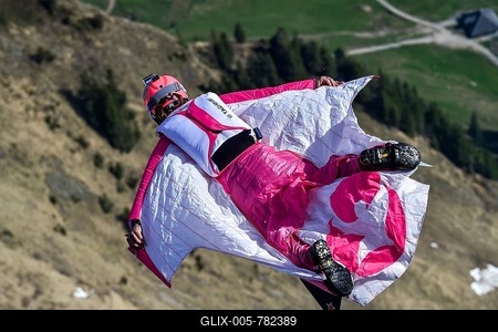 Base jumper flying with wingsuit in the air, jump from Mount Pilatus, Lucerne, Switzerland-stock-foto