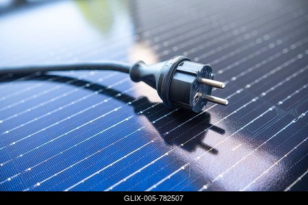 Schuko plug on a solar panel-stock-foto