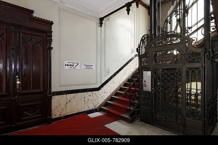 Staircase and old elevator in a Wilhelminian style building, Fasanenstrasse, Charlottenburg district, Berlin, Germany, Europe-stock-foto