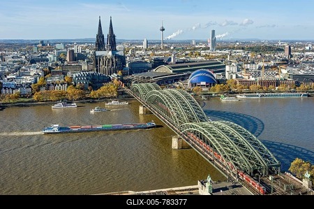 View over the river Rhine, Cologne's historic centre, Cargo Ship, Museum Ludwig, Cologne Cathedral, Hohenzollern Bridge, Central Station, Musical Dome, behind Colonius TV tower and KölnTurm, Cologne, North Rhine-Westphalia, Germany-stock-foto