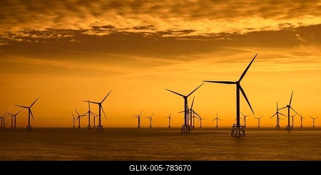 Wind turbines of the Thorntonbank Wind Farm, offshore windfarm off the Belgian coast in the North Sea at sunset-stock-foto